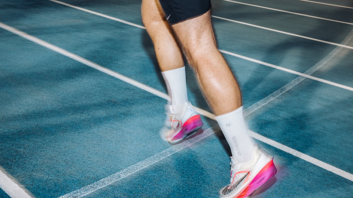 Runner&rsquo;s calves and Achilles tendons driving off a track &mdash; fixing Achilles tendonitis at Forward Physio Tampa